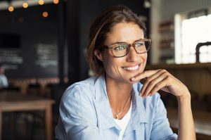 smiling woman with glasses cosmetic specials